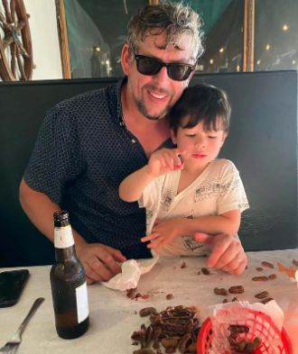 Patrick Carney with his son