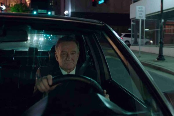 Susan's husband Robin Williams driving his car