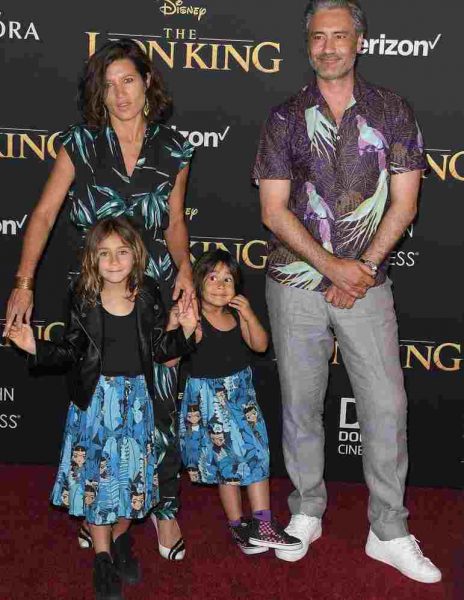 Taika Waititi and Chelsea Winstanley with their children