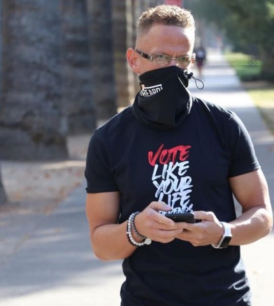 Damien Barling with his phone