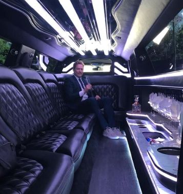 James Tupper inside his luxurious car