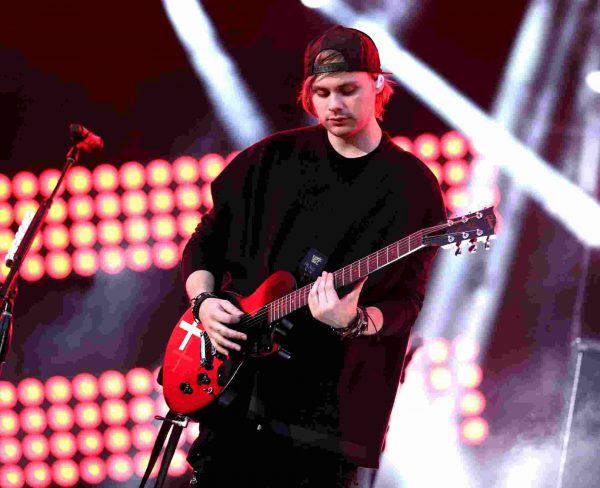 Michael Clifford while performing on the stage