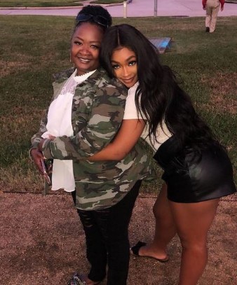 Miracle Watts with her mother