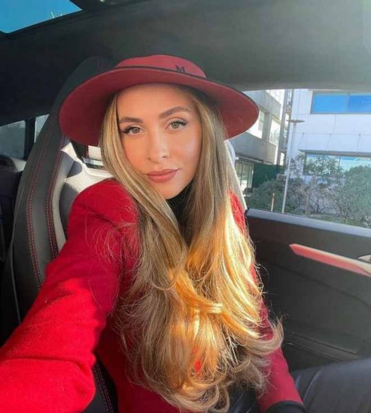 Lolita Osmanova inside her car