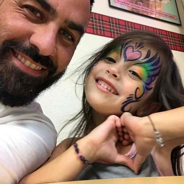 Chris Nunez with his daughter