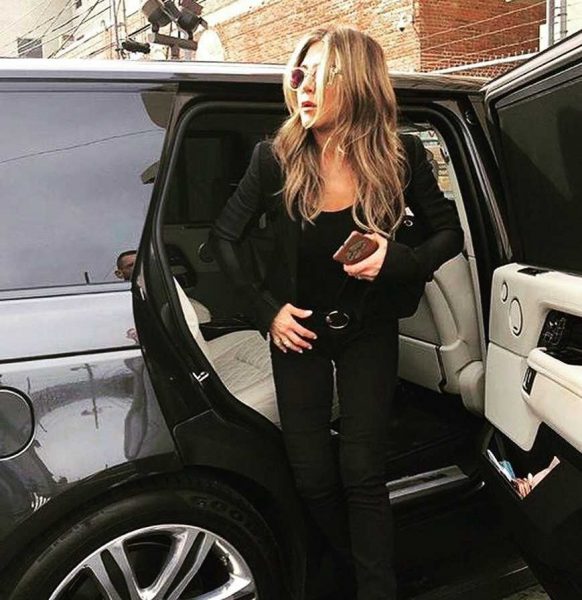 Jennifer Aniston stepping out of her car
