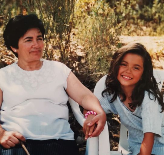 Sara Barradas's childhood photo with her grandmother