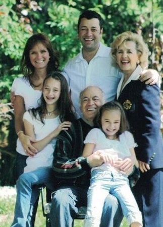 Nikki Roumel with her parents