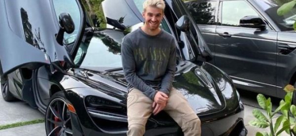 Drew Taggart with his car