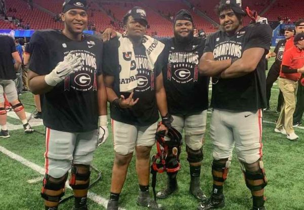 Devin Willock with his teammates