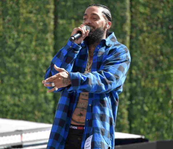 Nipsey Hussle performing on the stage