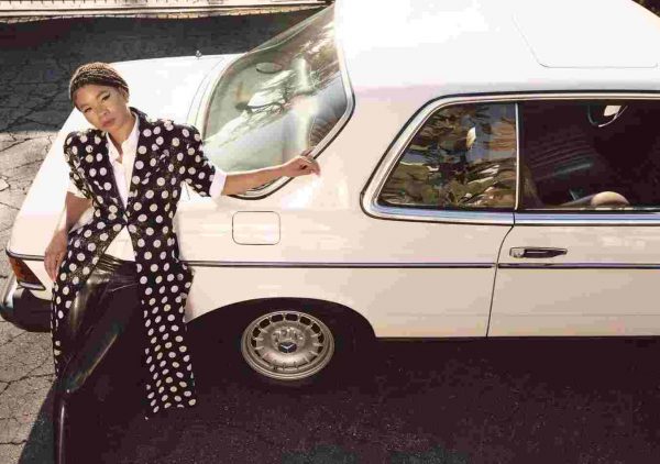 Storm Reid posing with her car