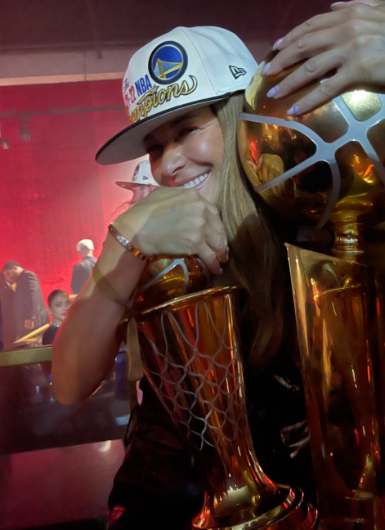 Sonya Curry with her son's trophy