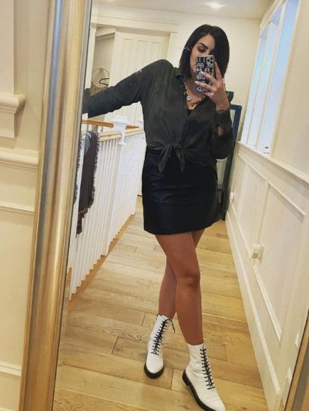 Katie Maloney with her phone