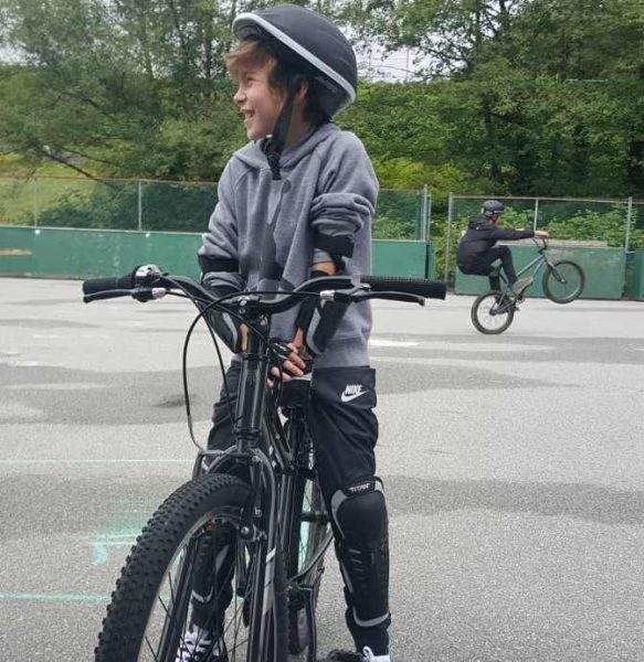 Jacob Tremblay with his bicycle