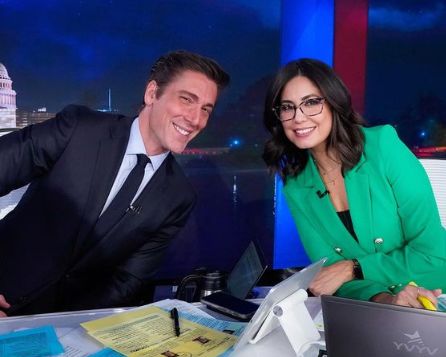 Cecilia Vega with her co-worker