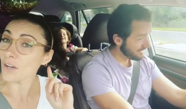 Laura Benanti with her husband and daughter inside her car