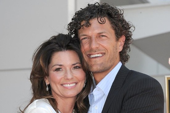  Shania with her husband 
