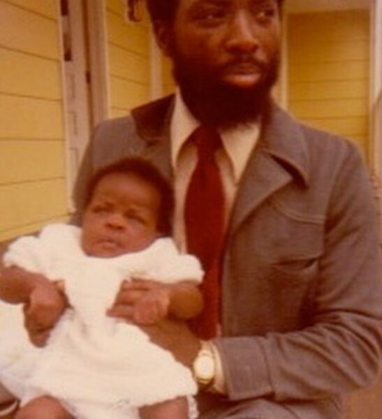 Childhood photo of Danai Gurira with her father