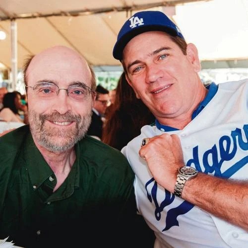 George Winston posing with his friend
