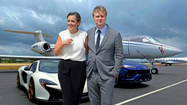 Christopher with his wife infront of the plane