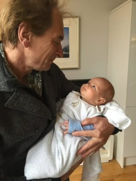 Julian with his child