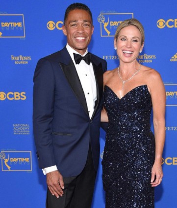 Amy posing with her partner