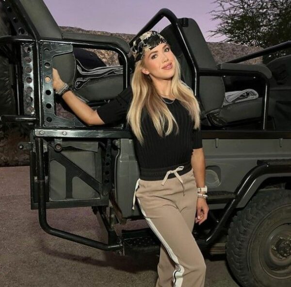 Gracie Hunt with her vehicle