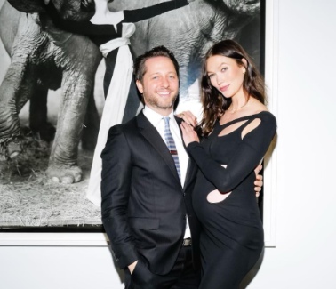 Karlie posing with her husband