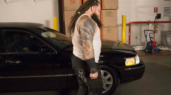 Bray Wyatt infront of his car
